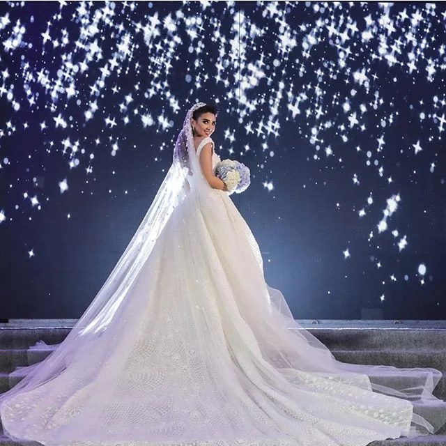 Luxurious wedding hall with suspended floral lighting