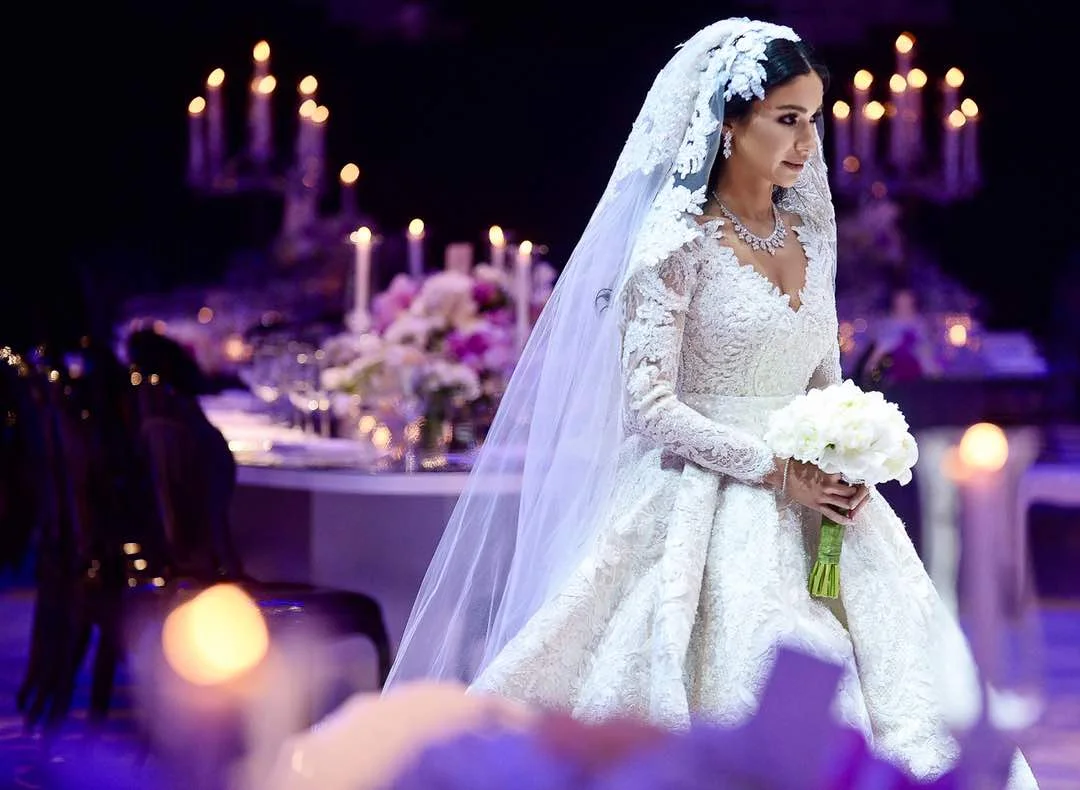 Bride in front of a sparkling dark backdrop